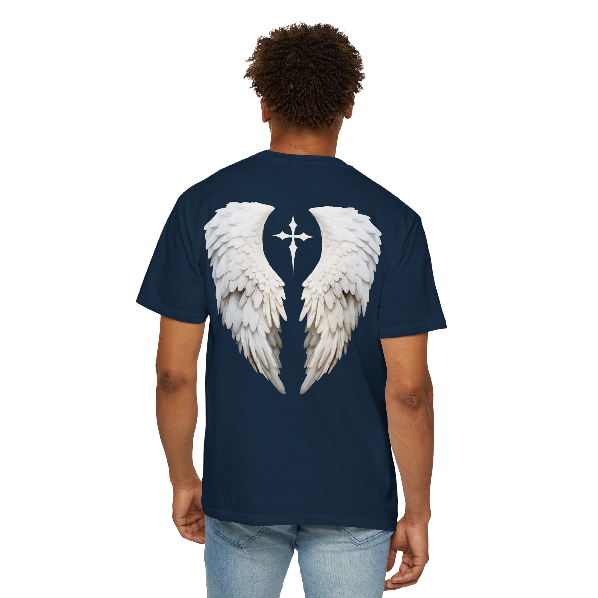 Person wearing a navy blue t-shirt with white angel wings design on the back against a white background