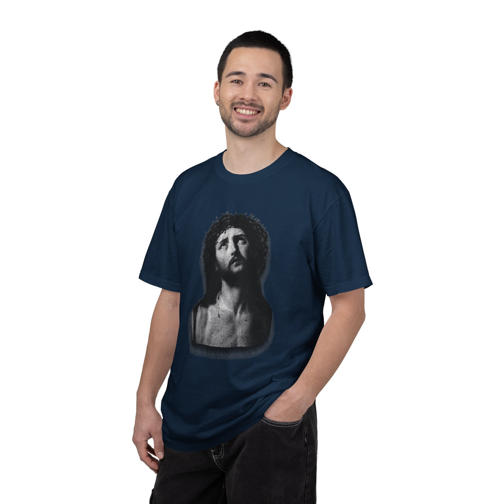 Man wearing a navy blue t-shirt with a graphic design on a white background