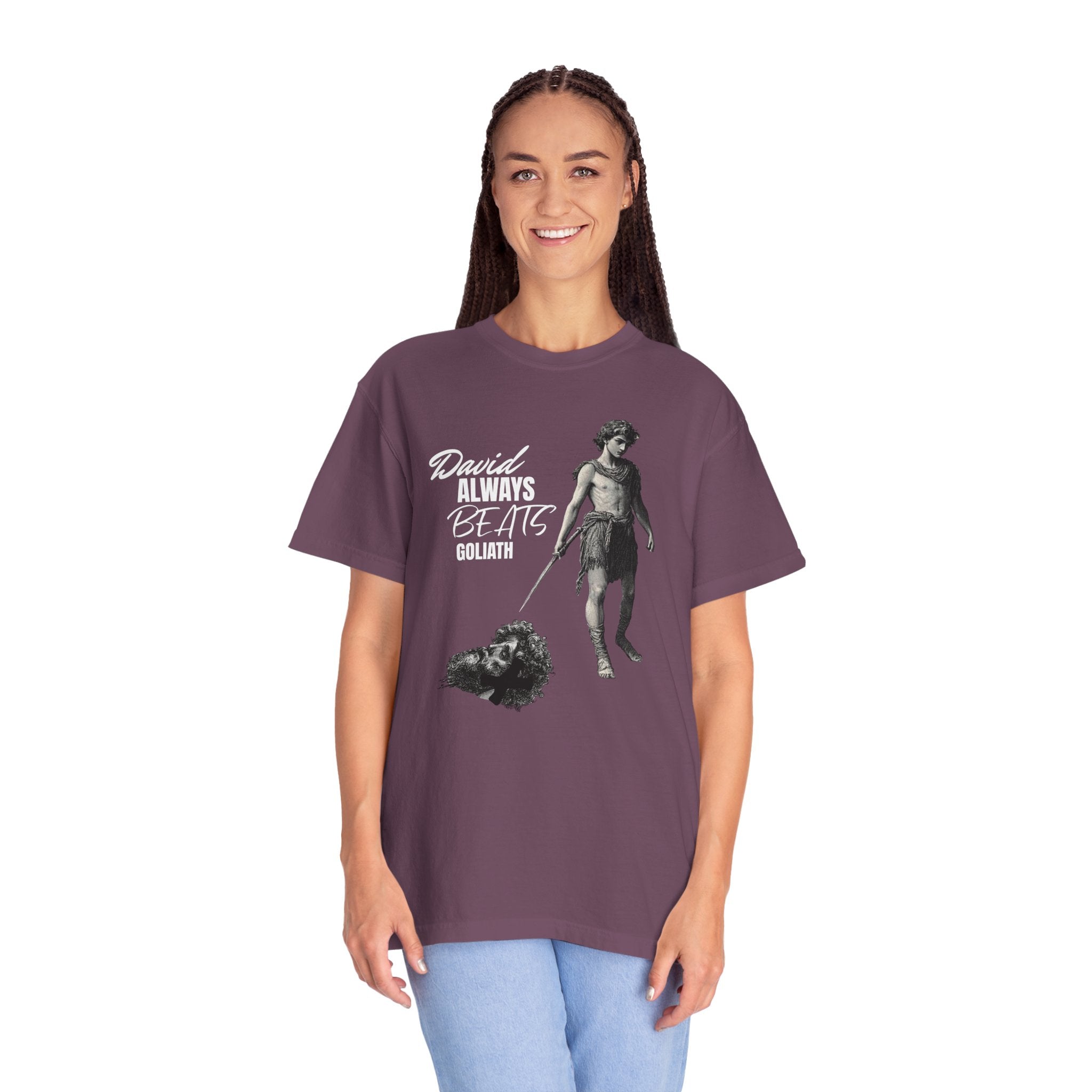 Person wearing a purple t-shirt with a graphic design and text on a white background