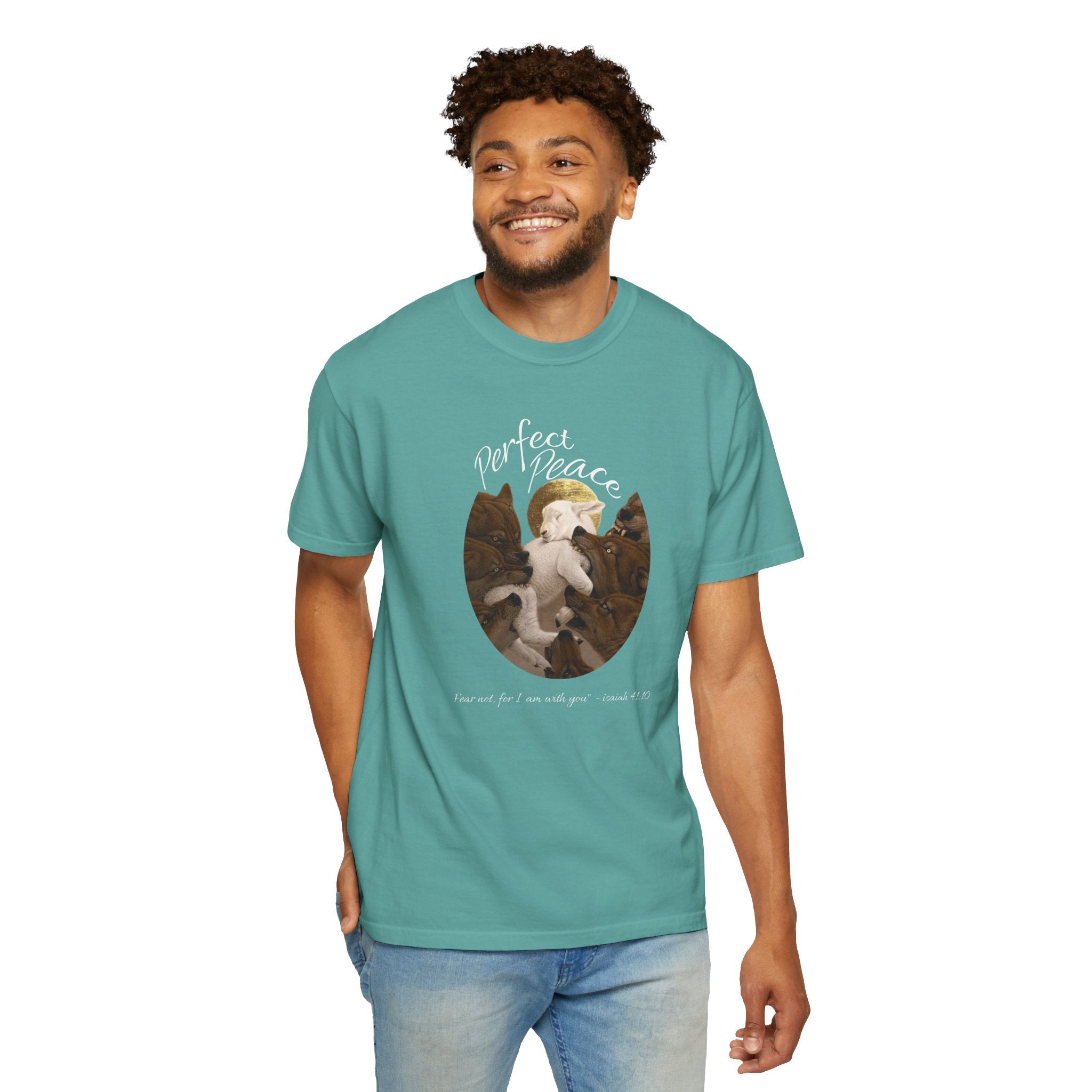 Man wearing a teal t-shirt with a graphic design on a white background