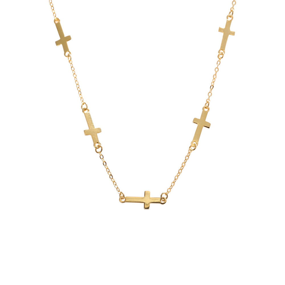 Gold necklace with small crosses on a white background