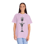 Person wearing a light purple t-shirt with a graphic design on a white background