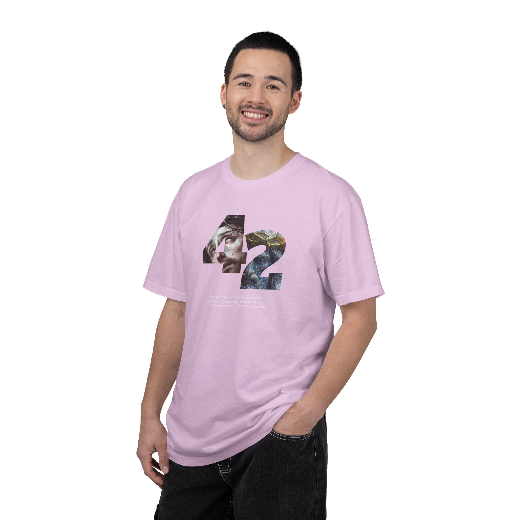 Man wearing a pink t-shirt with a graphic design on a white background