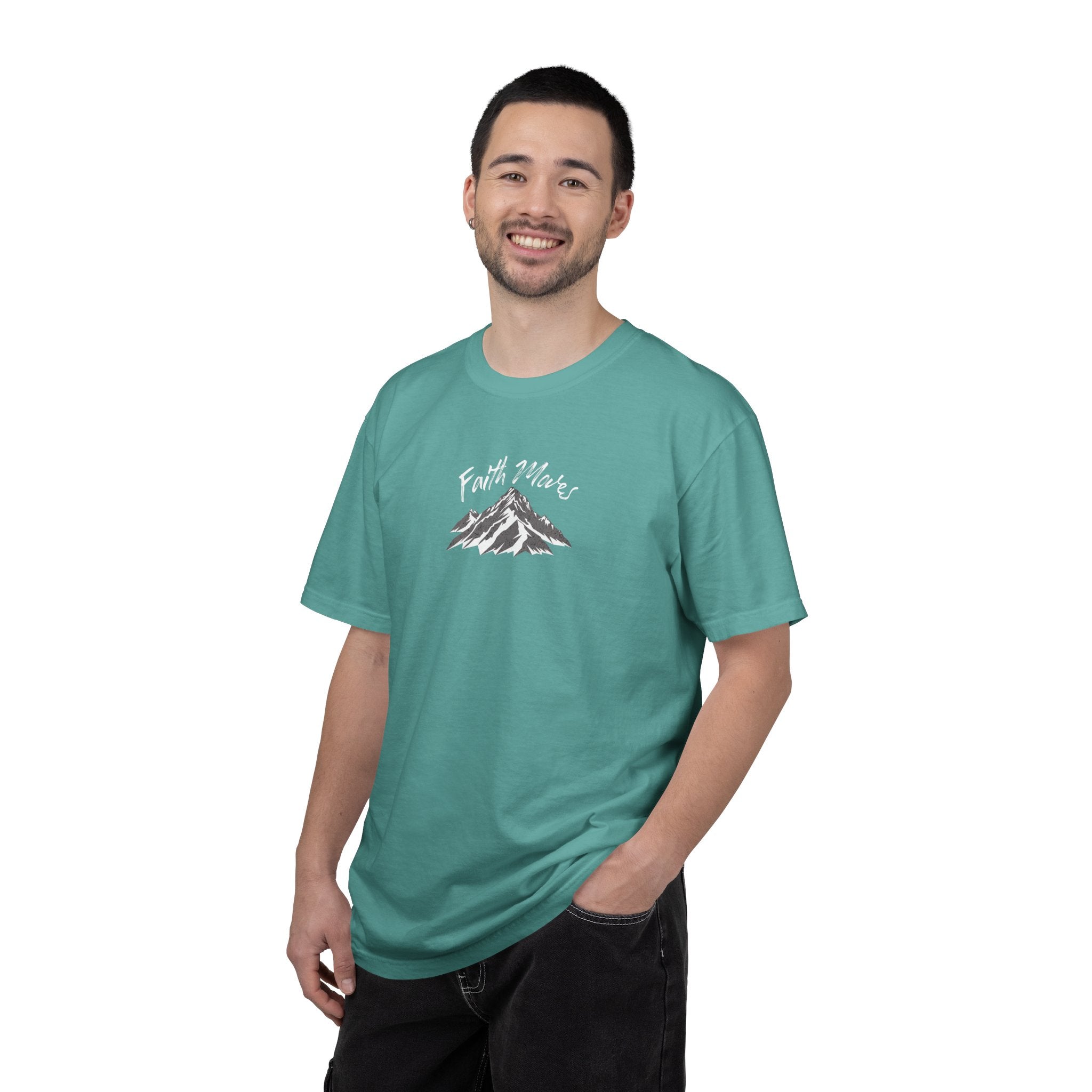 Man wearing a teal t-shirt with 'Dream State' logo on a white background