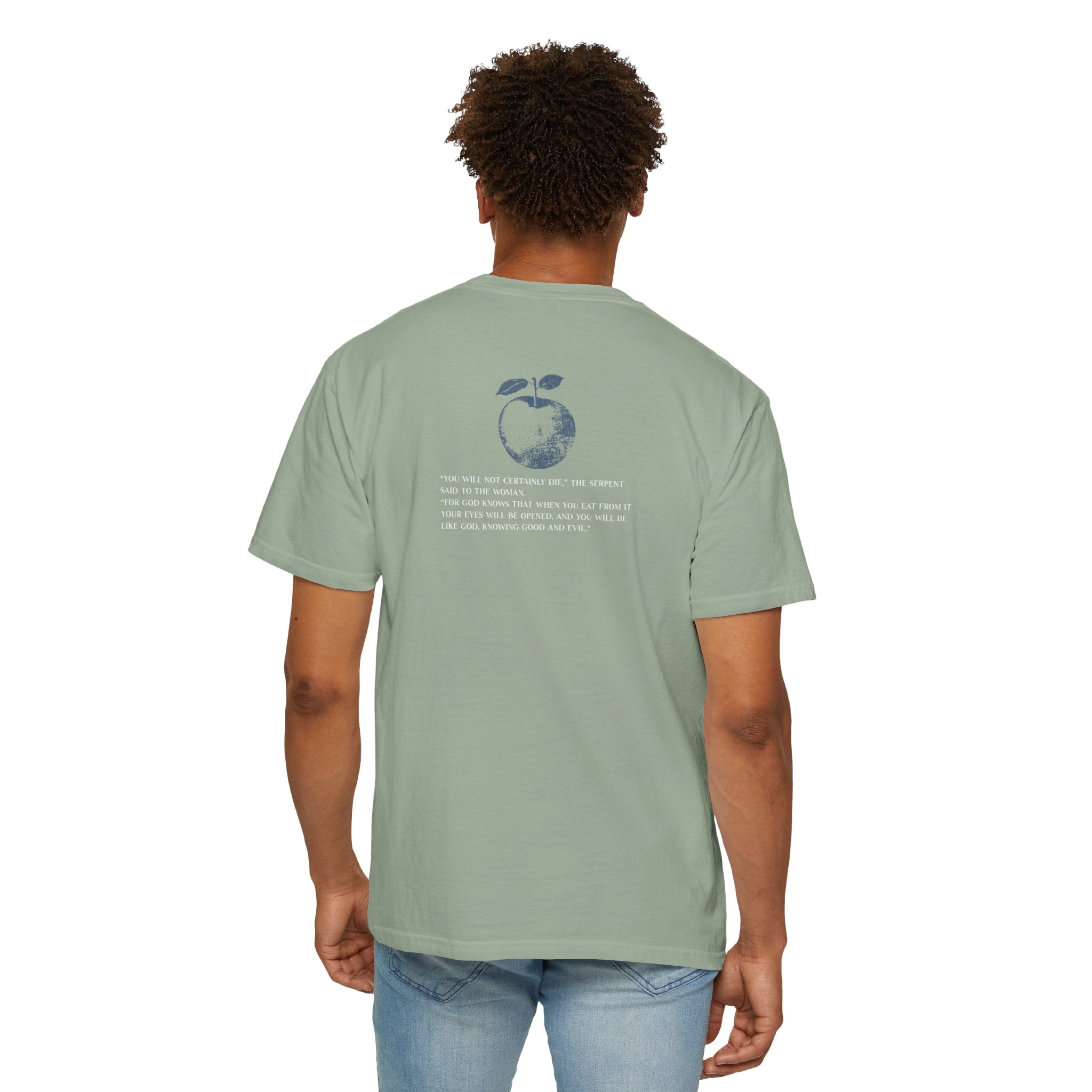 Person wearing a green t-shirt with a graphic and text on the back, standing against a white background