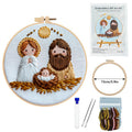 Embroidery DIY art kit with completed embroidery of a nativity scene, tools, and packaging on a white background.