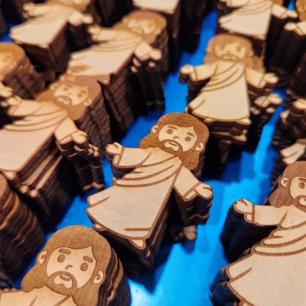 Wooden figures of a religious figure on a blue background