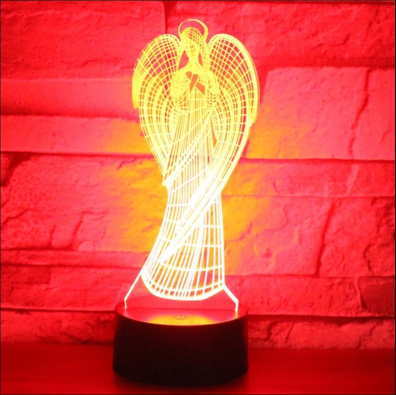 3D angel-shaped lamp with a red brick background