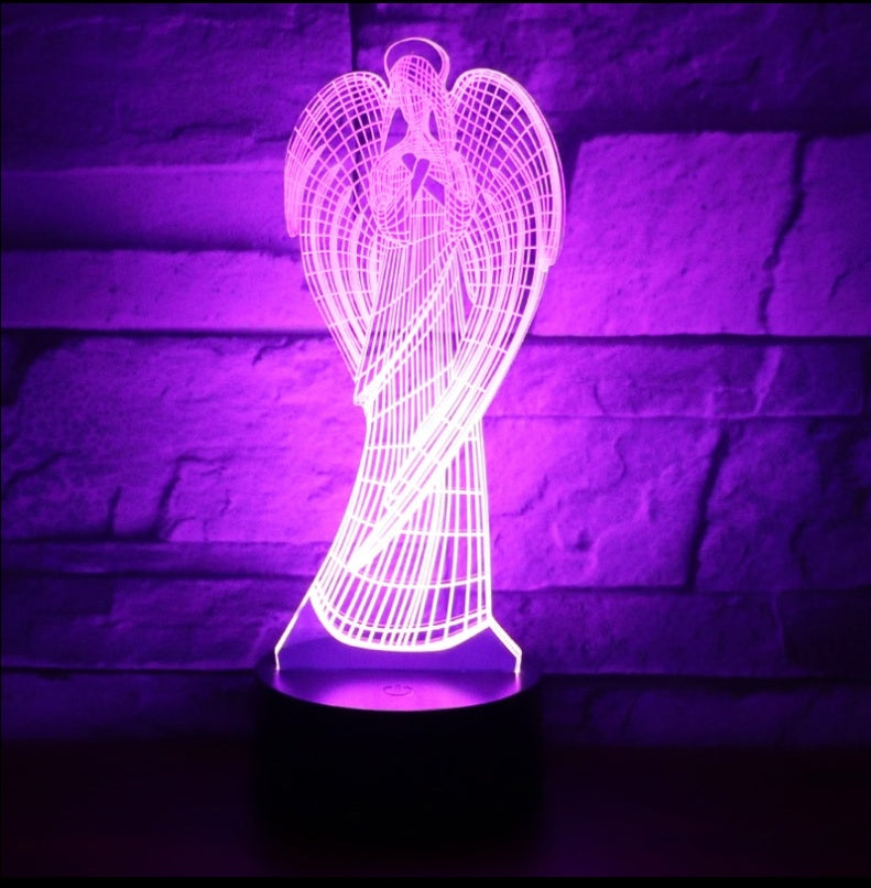 Angel-shaped lamp with a purple glow against a stone wall background