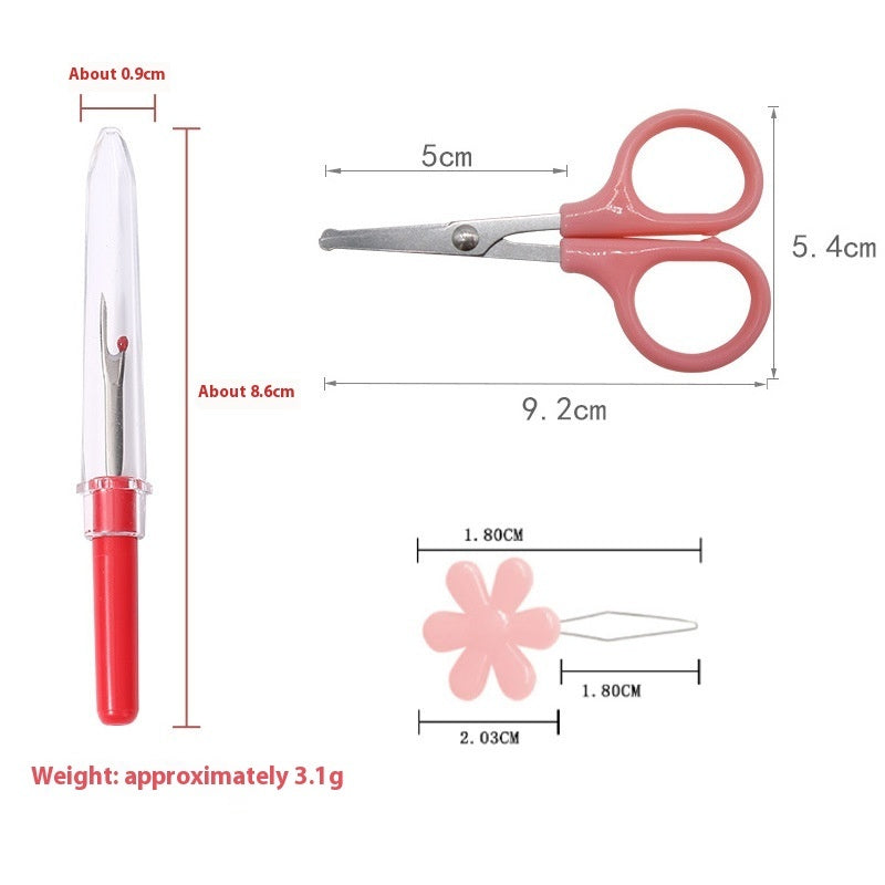 Measurement chart of a red pen, pink scissors, and a pink flower-shaped object on a white background.