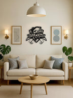 Living room with a 'Welcome' wall art piece above a beige sofa.