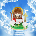 Toy figure of a shepherd with sheep against a blue sky background