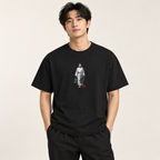 Model wearing the black Jesus Faith Walk unisex T-shirt in a studio