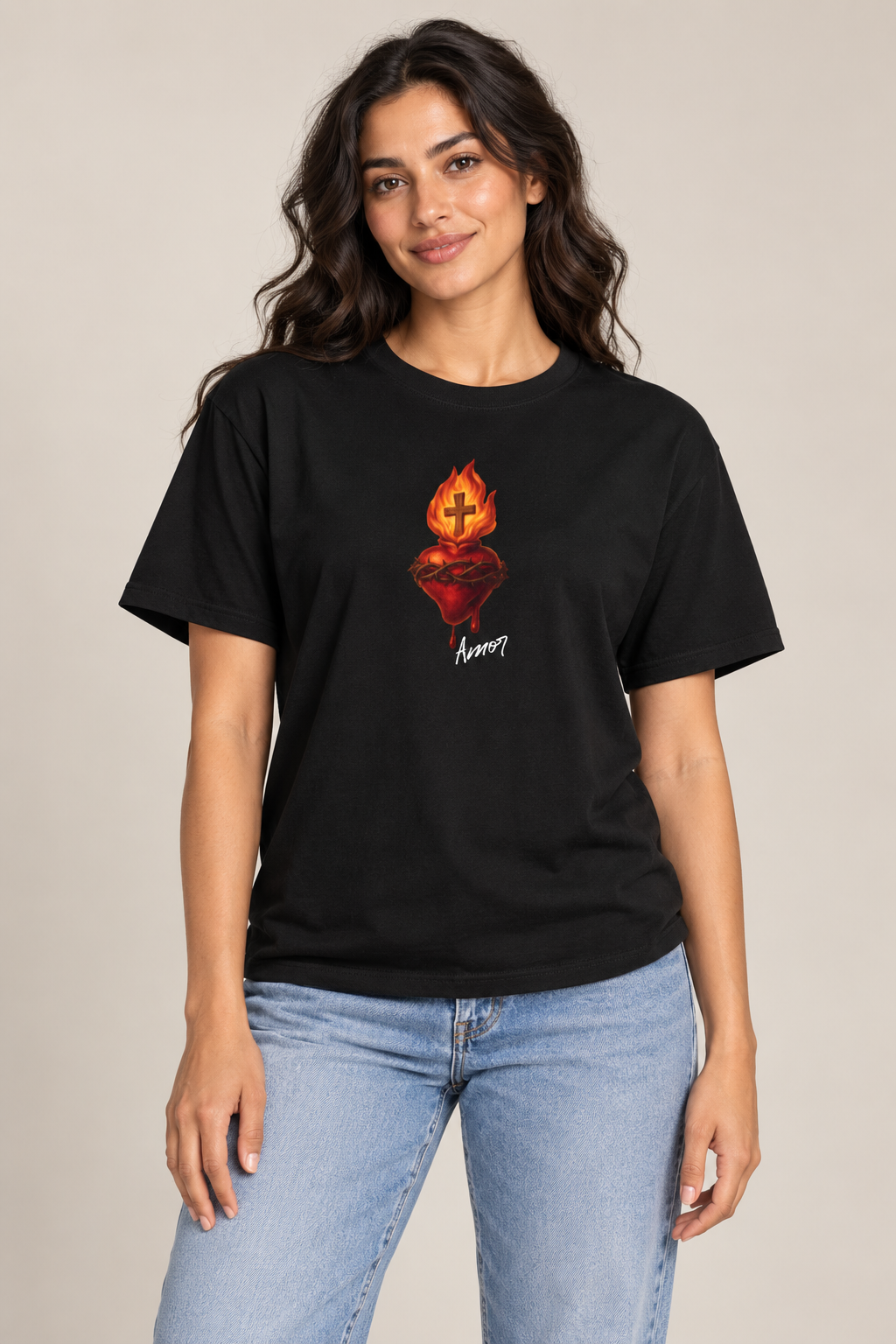 Model wearing the black Sacred Heart Amor unisex T-shirt in a studio